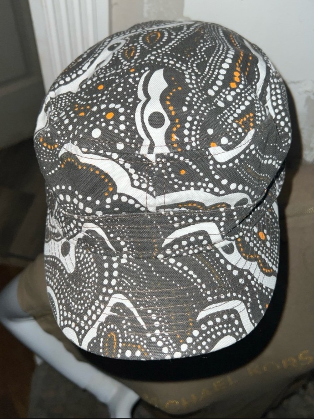 PRANA ORGANIC CTTN WOMEN’S CADET STYLE CAP W/ GRY/BRN GOLD & WHITE SWIRL DESIGN